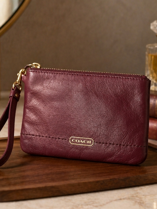 Coach Handbags - Coach Leather Burgundy Wristlet